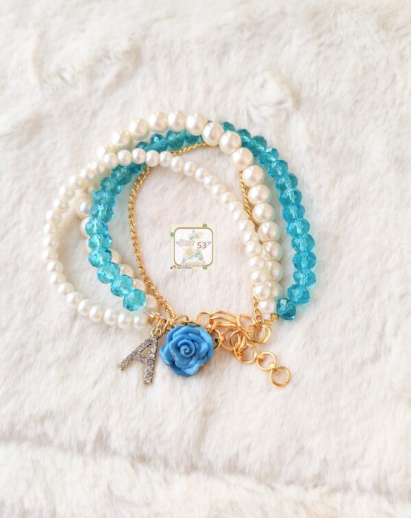 ocean breeze bracelet, rose and initial charm, 6.5 inches plus extra rings for adjustment