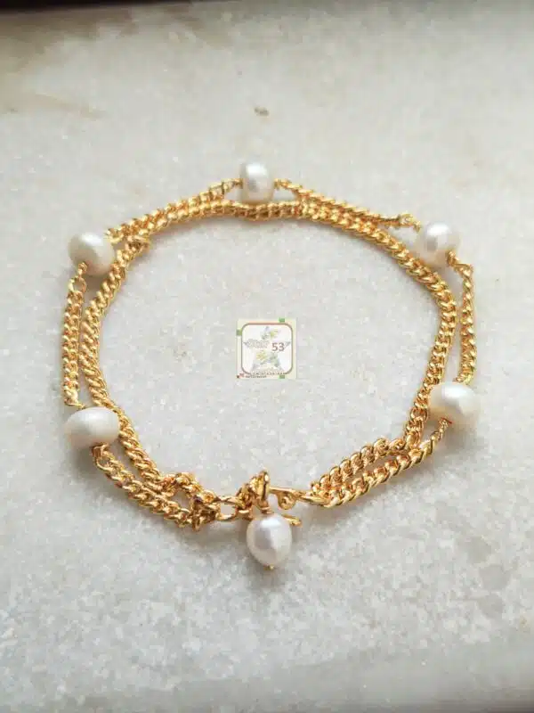 925 silver freshwater pearls bracelet. Dual lined.  gold polished