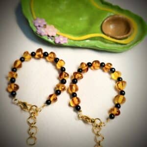 Baby nazariyas (set of 2)
Original European Baltic Amber (keroba) + Black quartz (aqeeq)