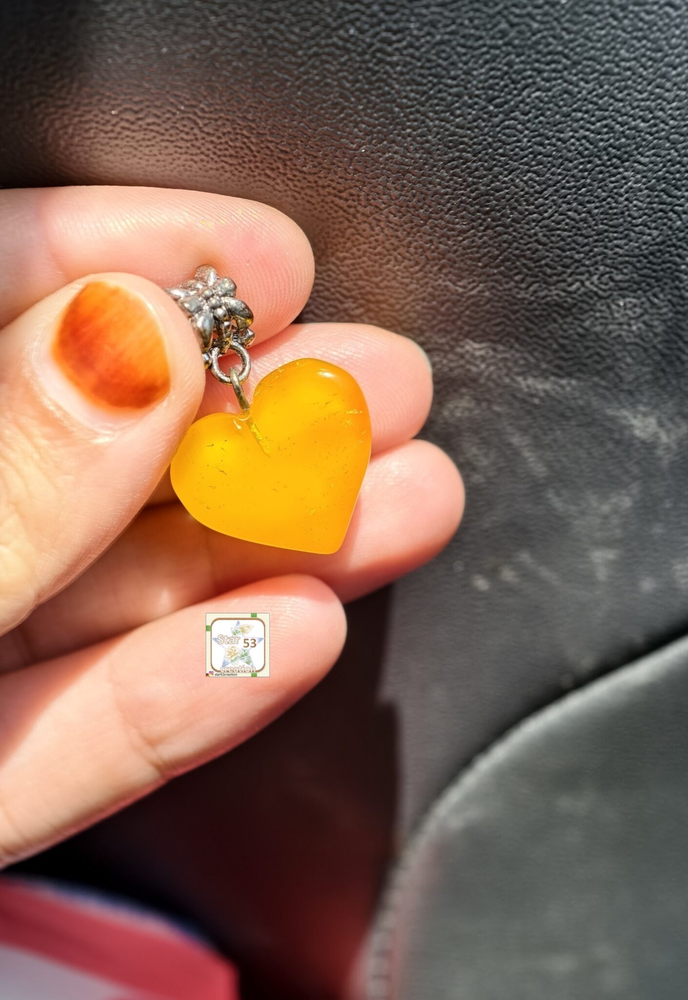 Amber heart pendant