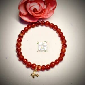 Carnelian bracelet, airplane brass charm