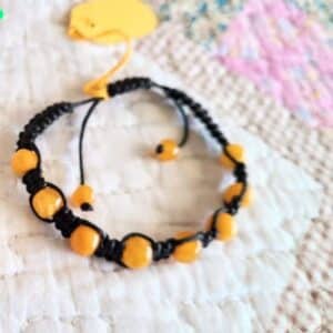 woven keroba bracelet, Original European baltic amber, black thread, rich butter gold keroba